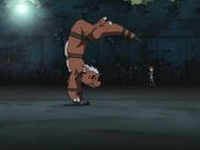 Growmon exercising with Takato in the background.